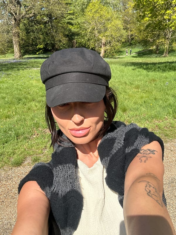 Woman takes outdoor selfies in Tunbridge Wells spring setting
