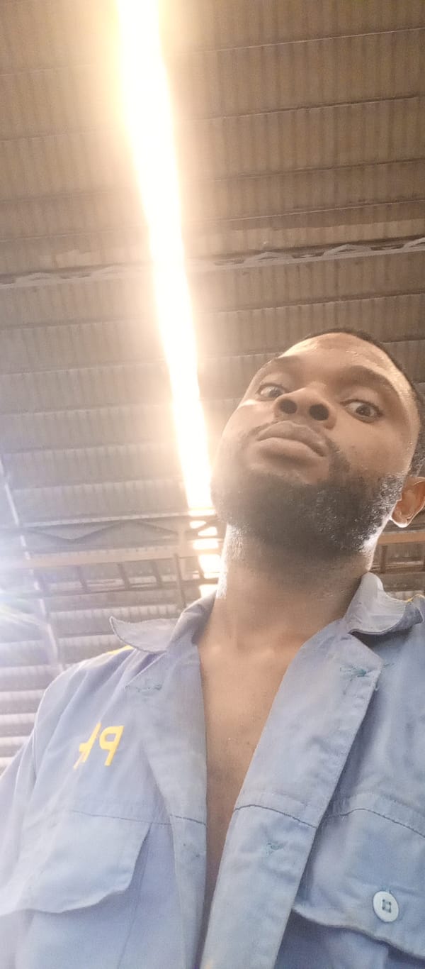 Worker documents warehouse operations in Magboro facility
