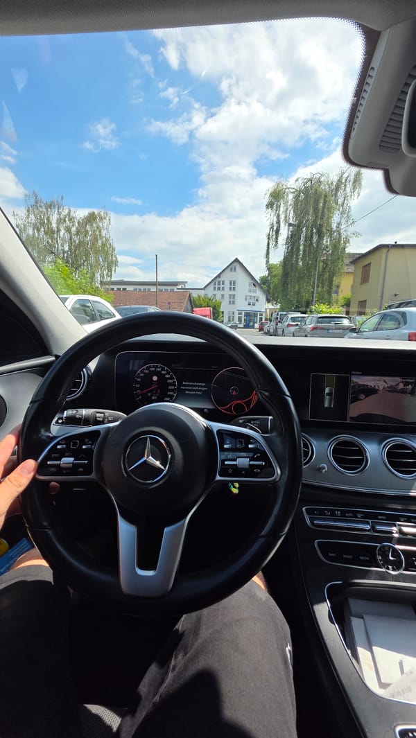 Cars, streets, and a midday drive on a regular afternoon