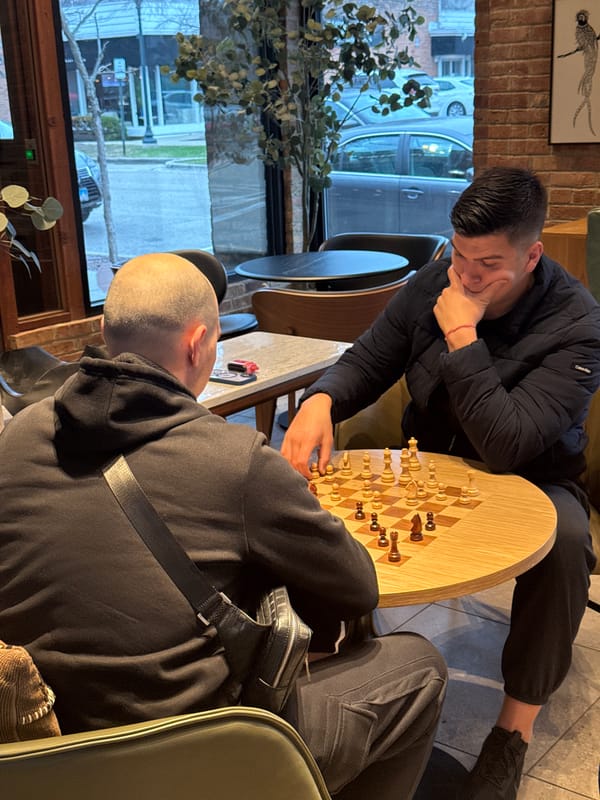 Two men play chess at Winnetka café