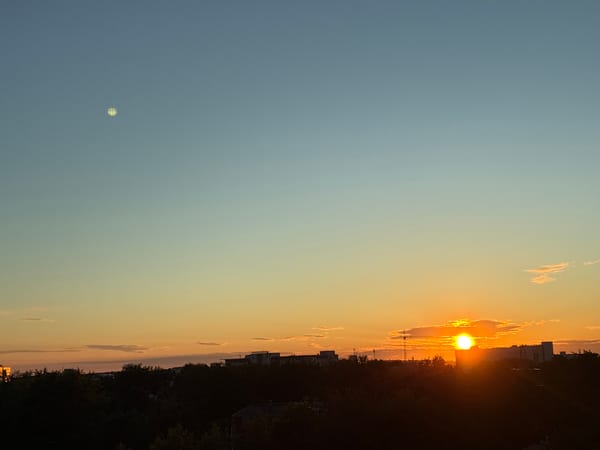 Sunset documented over urban skyline June 8, 2026