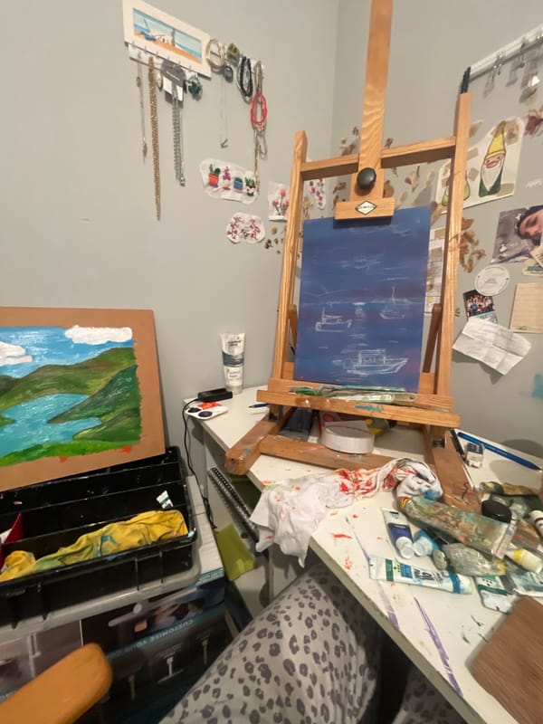 Artist's studio workspace documented during painting session in Maidstone