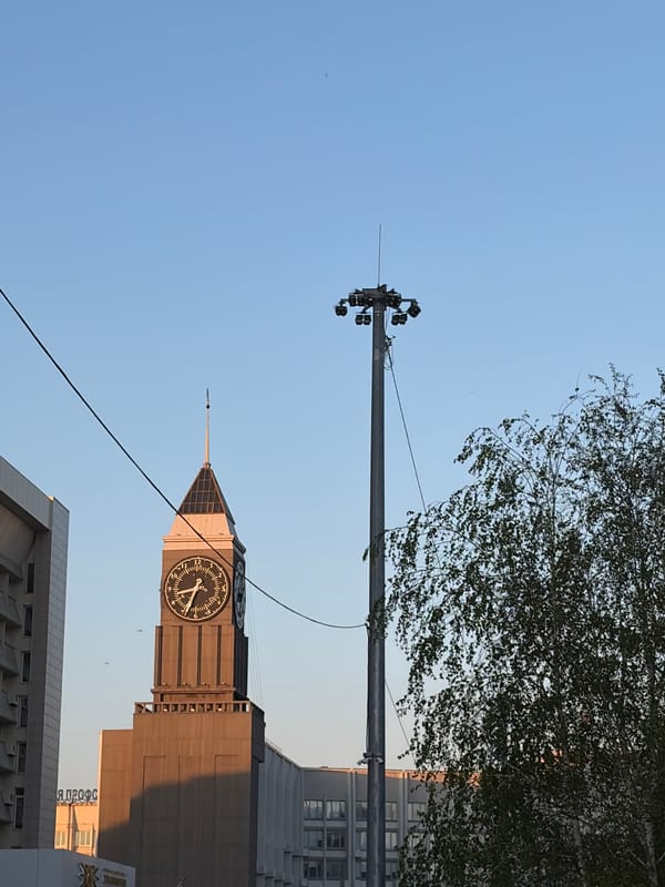Friends photograph landmarks during Krasnoyarsk city center tour