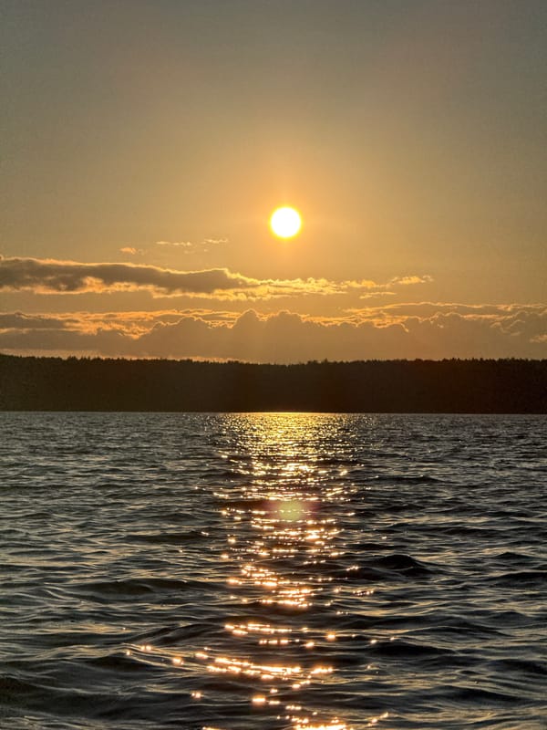 Sunset paddleboarding session captured on Russian lake