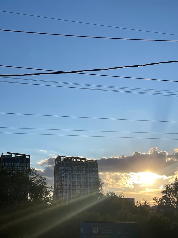 Sunny afternoon life documented across Izhevsk neighborhoods