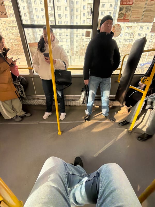 Ordinary moments captured in Krasnoyarsk: transit riders, elevator selfie