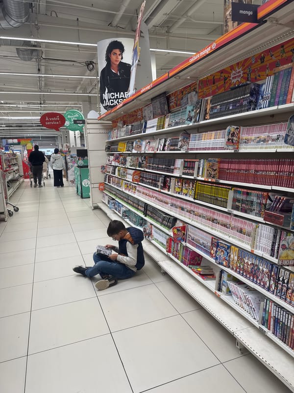 Shopper browses anime merchandise at specialty store in Leers