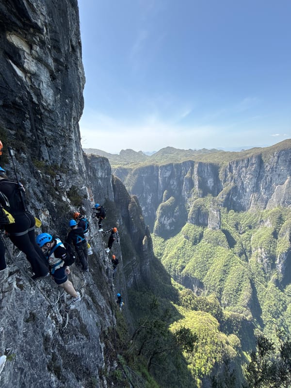 Adventurers climb via ferrata route in Yongding District mountains
