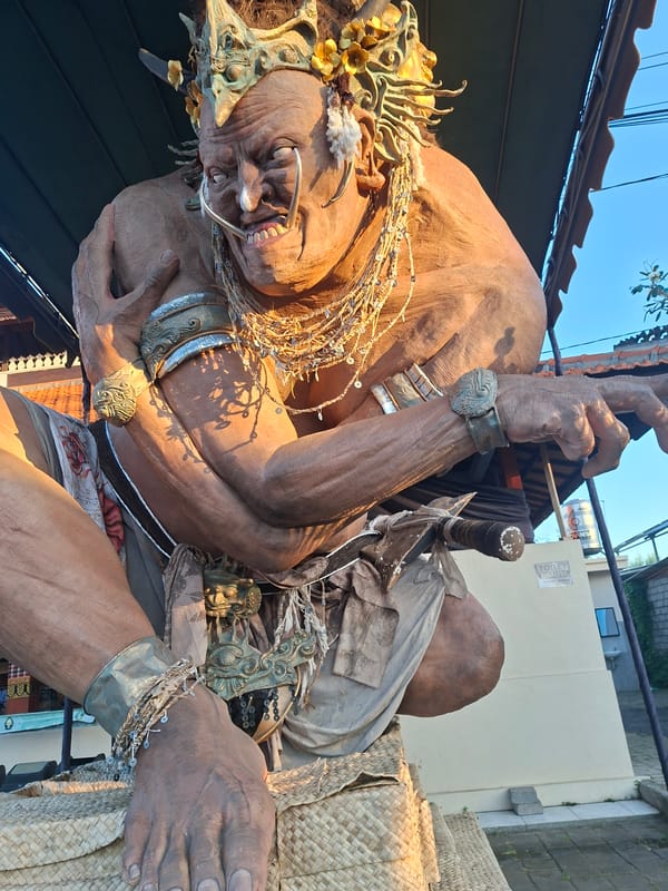 Sukawati's temples, statues, and streets on a Bali morning