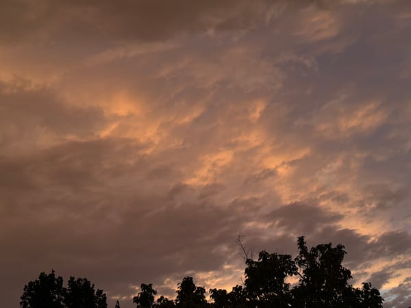 Vivid sunset clouds fill the sky above Chirchik, Uzbekistan