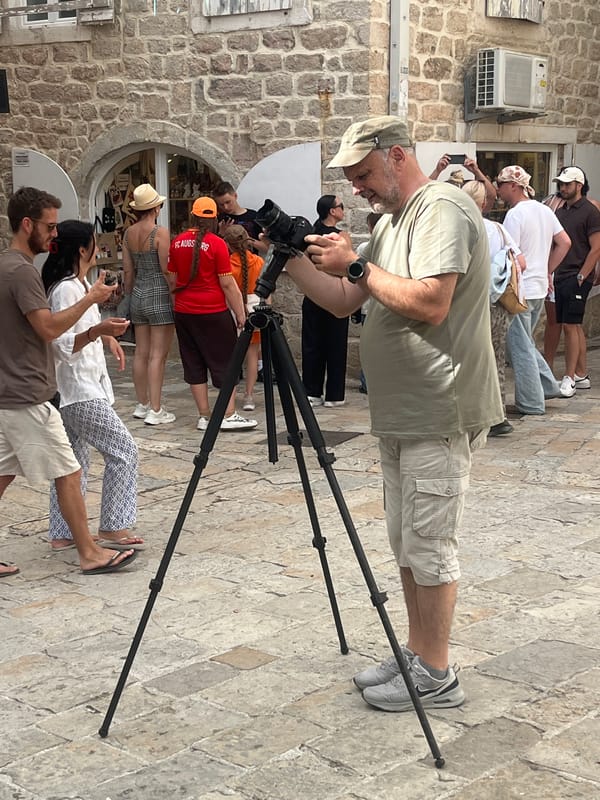 Afternoon pedestrian activity documented in Budva's historic Old Town
