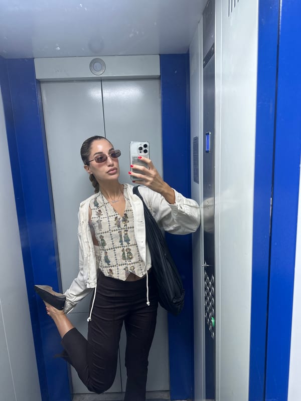 Elevator selfie moment in Moscow, styled and ready to go