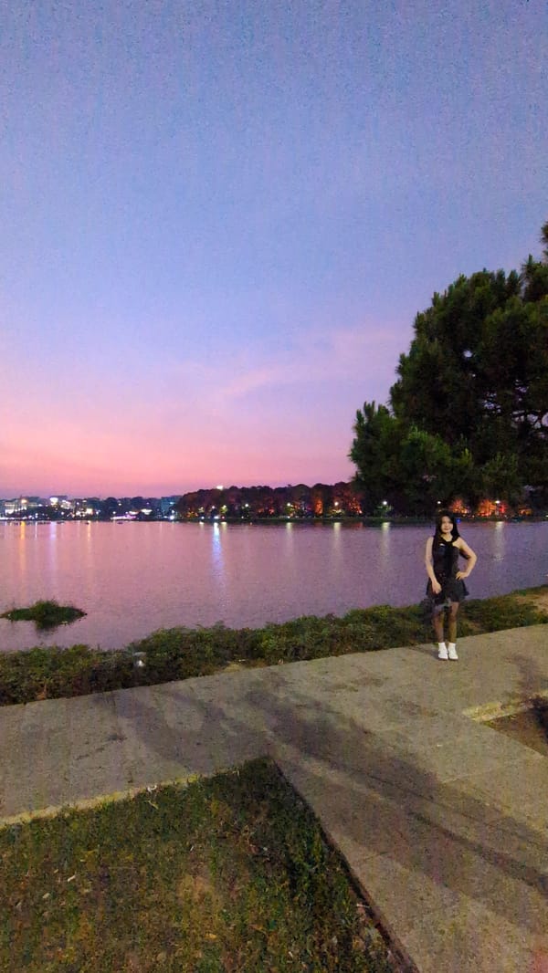 Sunset casts red glow over plaza in Da Lat