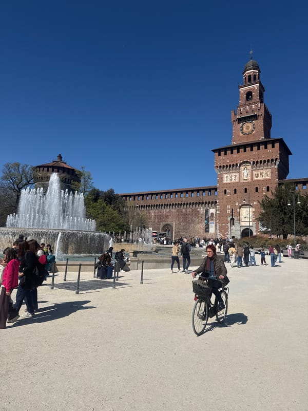 Spring crowds enjoy sunny morning at Milan's Sforza Castle