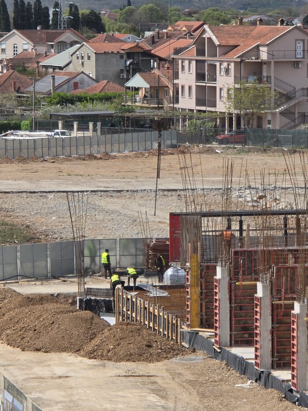 Construction workers active at Podgorica high-rise building site