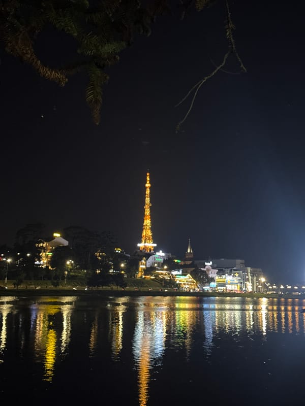 Da Lat's Eiffel Tower replica illuminated at Xuan Huong Lake