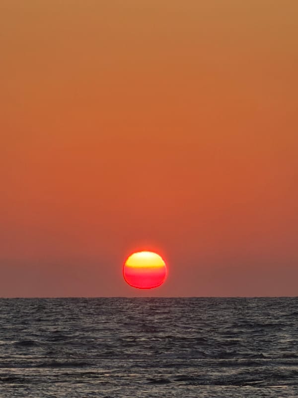 Mediterranean sunset from a Tel Aviv beach, late June