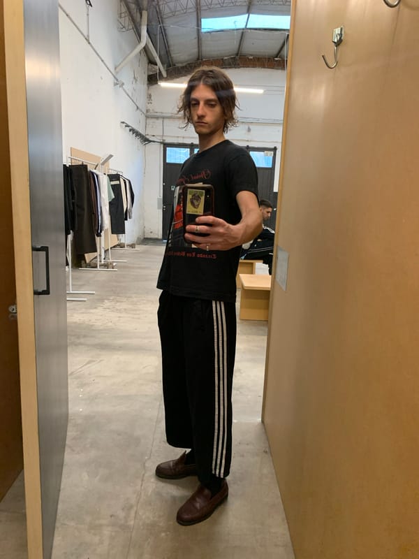 Young men take selfies indoors in Buenos Aires