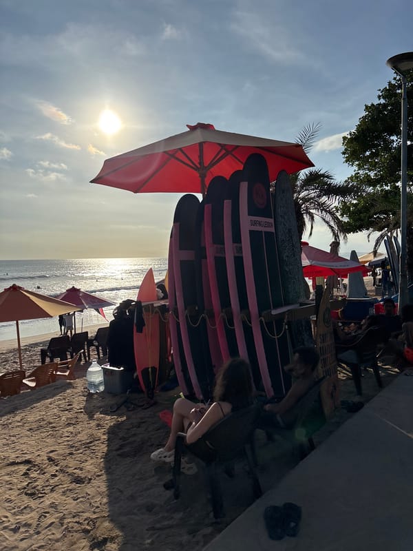 Morning activities at Kuta beachside skatepark blend surfing and skating
