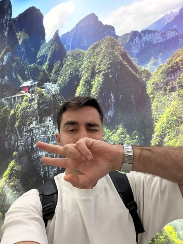 Tourists photograph Zhangjiajie park displays in China