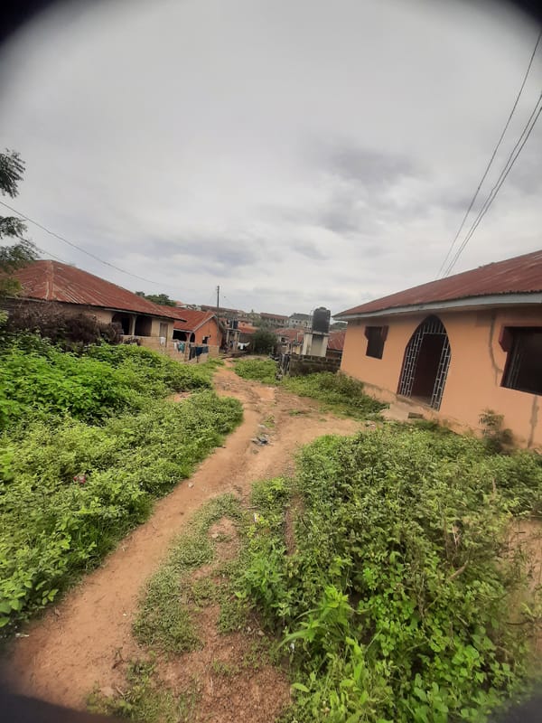 Walking through residential streets in Ogbomosho, Nigeria