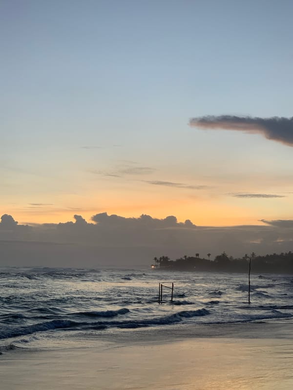Families enjoy sunset beach time along Sri Lankan coast