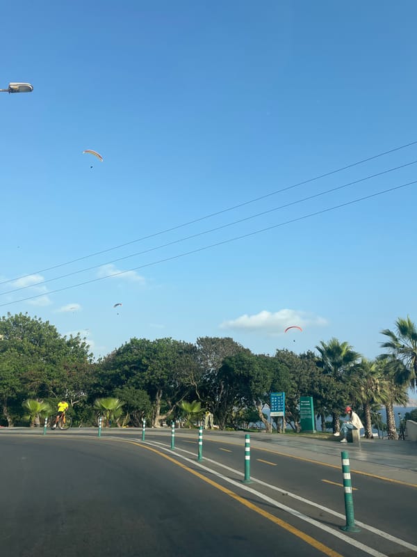 Paragliders spotted over Miraflores coastal road, Peru