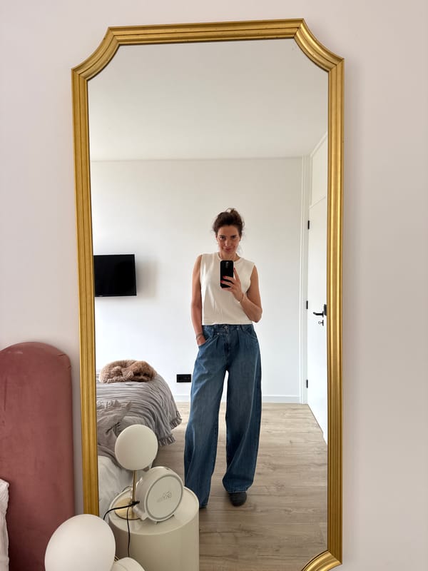 Woman takes selfie in ornate mirror, Vila Nova de Gaia