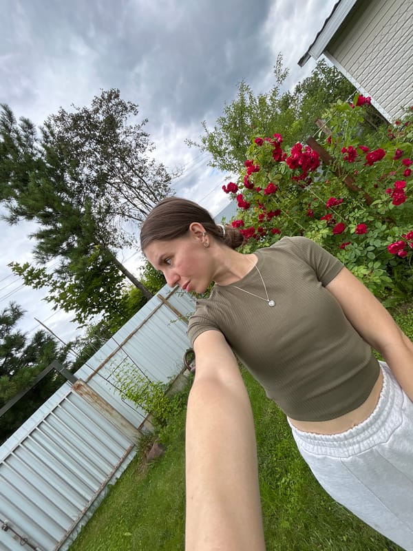 Hanging out by the roses in Klin on a summer morning