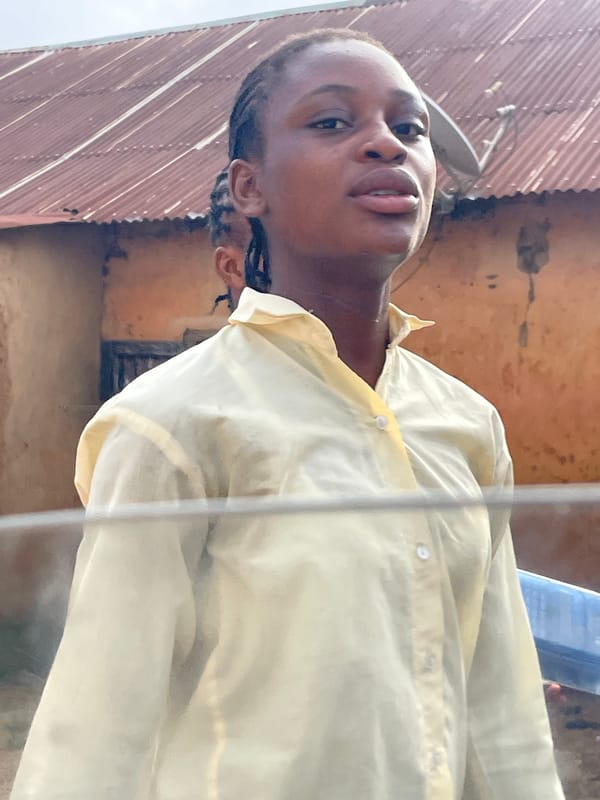 Morning street life and urban details in Bukuru, Nigeria