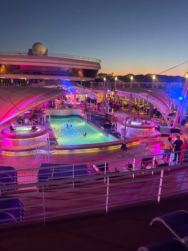 Cruise ship pool deck buzzing off the coast of Ibiza