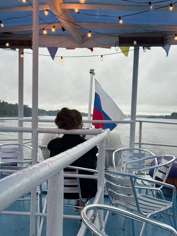 River cruise near Shebunino under cloudy Russian skies