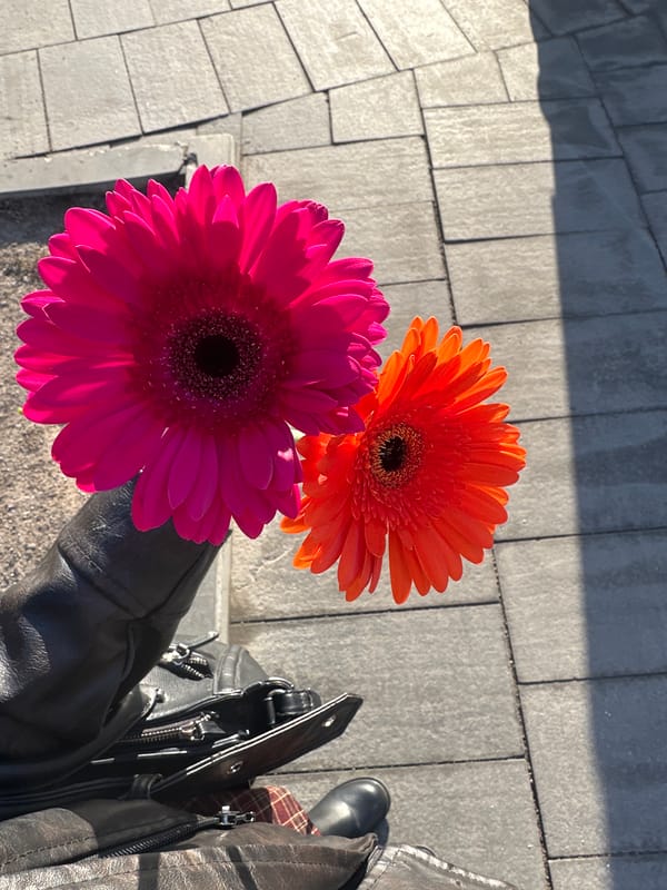 Flowers and personal items spotted on Moscow pavement
