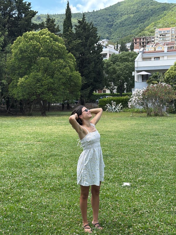 Woman's morning photo session documented across Budva park