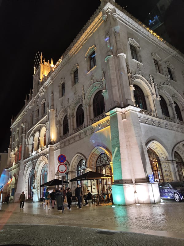 Evening documentation of illuminated Neo-Manueline building in Lisbon