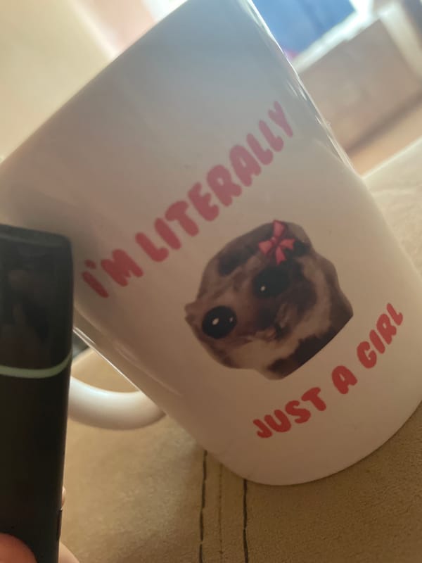 White ceramic mug found tilted in Varna indoor setting