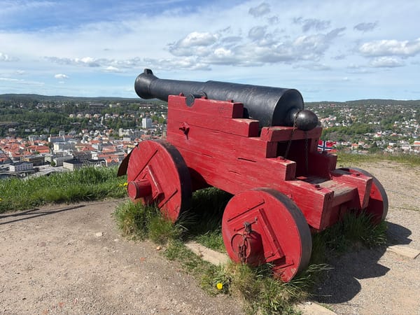 Historic cannon overlooks Halden cityscape from hilltop position