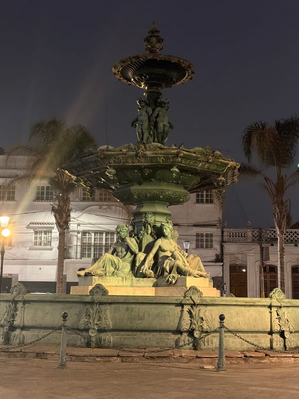 Nighttime scenes documented across historic downtown Tacna, Peru