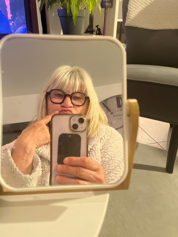 Woman Takes Mirror Selfie in Chambœuf, France
