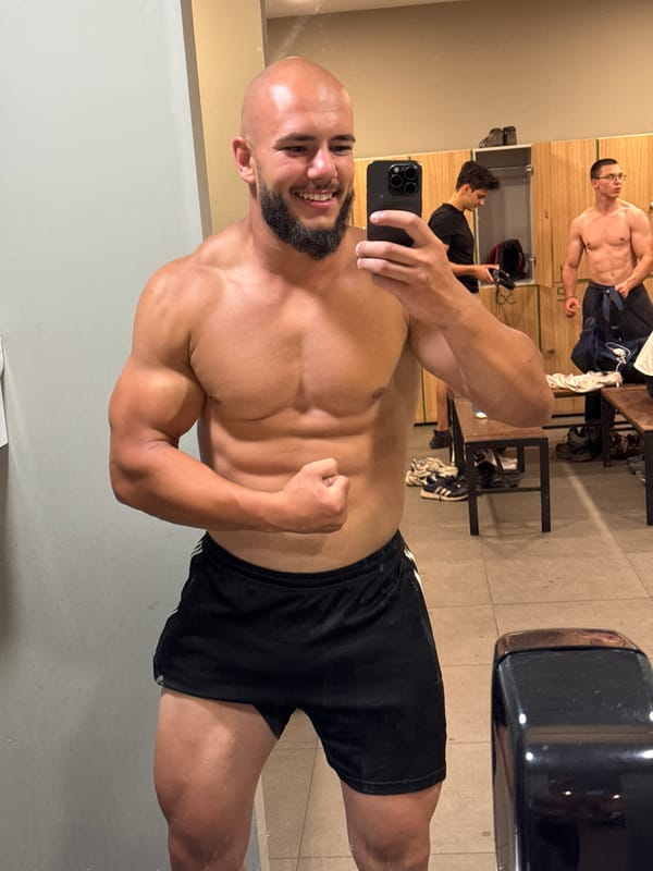 Post-workout mirror selfies in a Sofia gym locker room