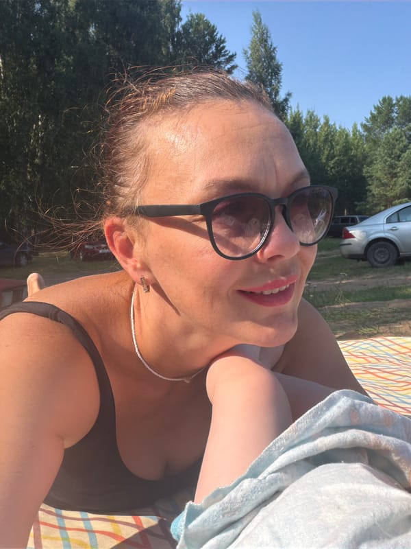 Lazy summer day at the water's edge in Noviy, Russia