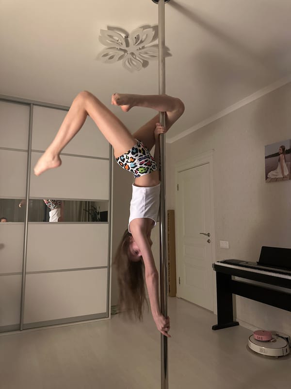 Woman practices pole dancing in Tomilino, Russia indoor venue