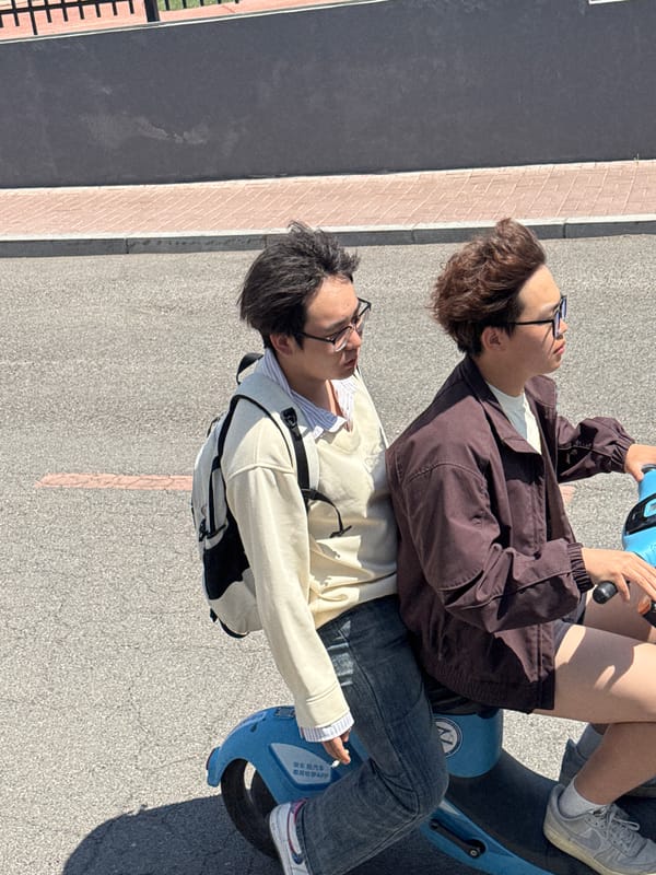 Young people ride shared scooters in sunny Zhongtun morning