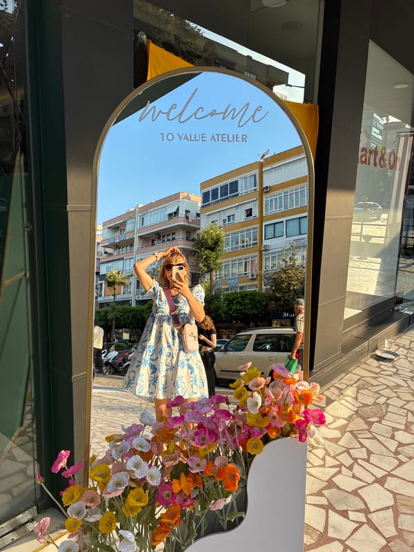 Selfie and storefront florals outside an Alanya shop