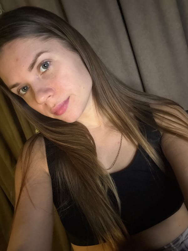 Woman photographed in indoor setting in Batumi, Georgia