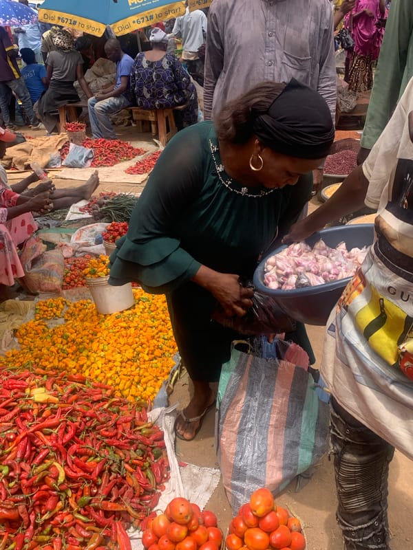 Routine market activity documented in Jos, Nigeria marketplace