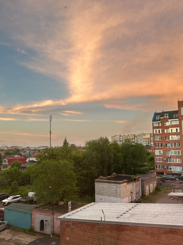 Omsk residential streets and skyline at golden hour