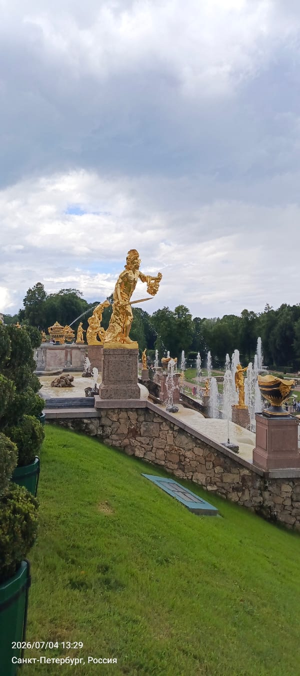 Exploring Peterhof's fountains and golden cascade on a grey summer day