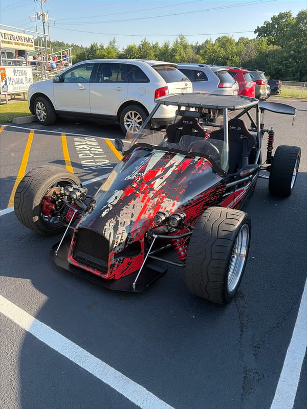 Custom red, white, and black vehicle at Wisconsin Dells memorial park