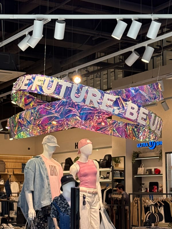 Family afternoon at a Kyiv shopping mall, June 2026
